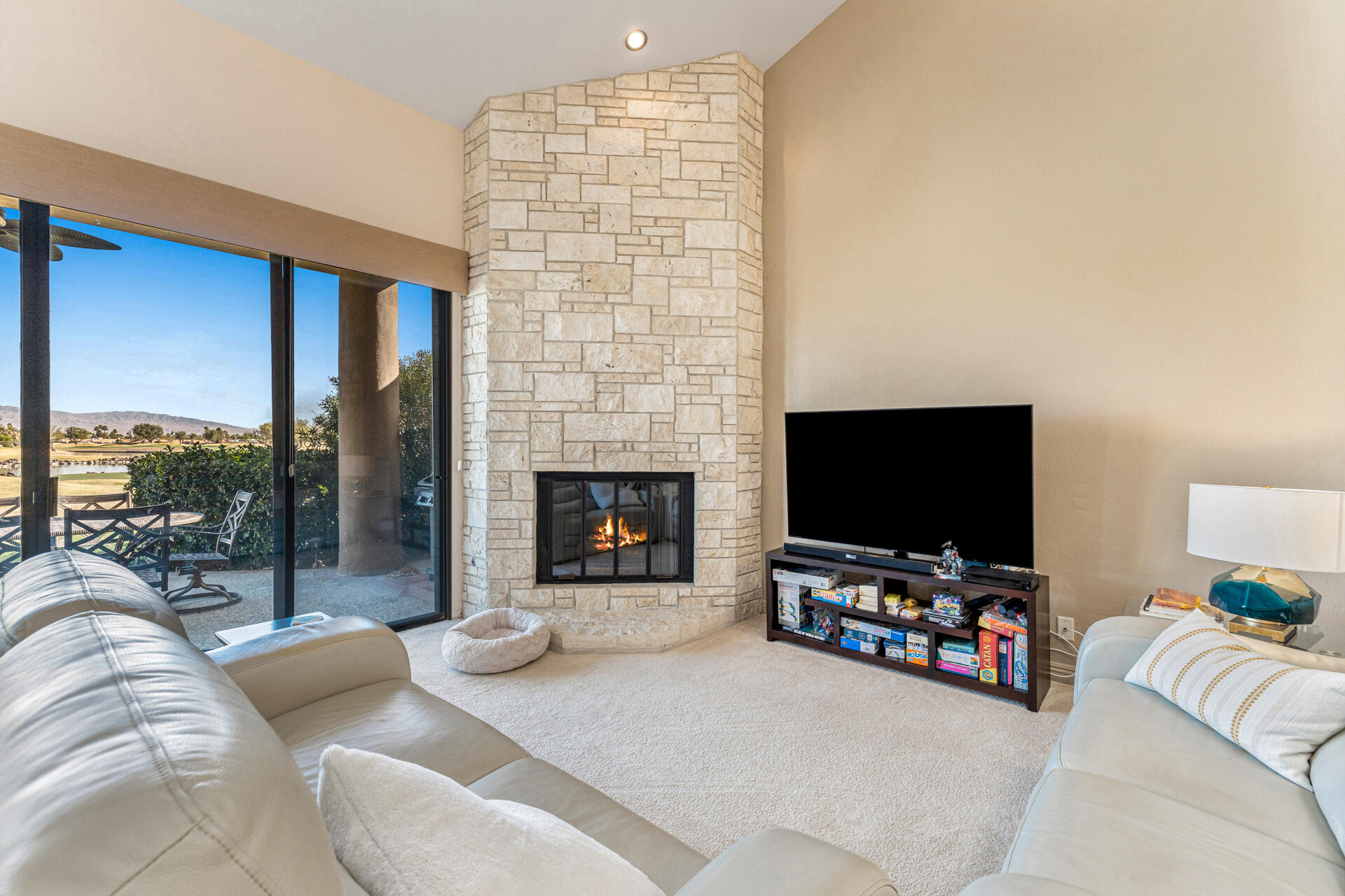55764 Oak-Tree La Quinta, CA 92253 - Photo 17 of 50 a living room with furniture and a flat screen tv