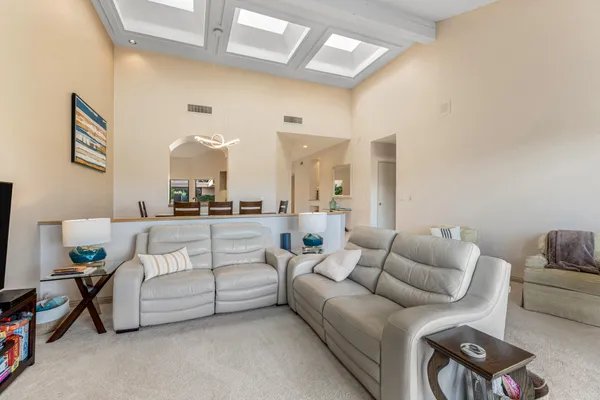 a living room with furniture and a couch