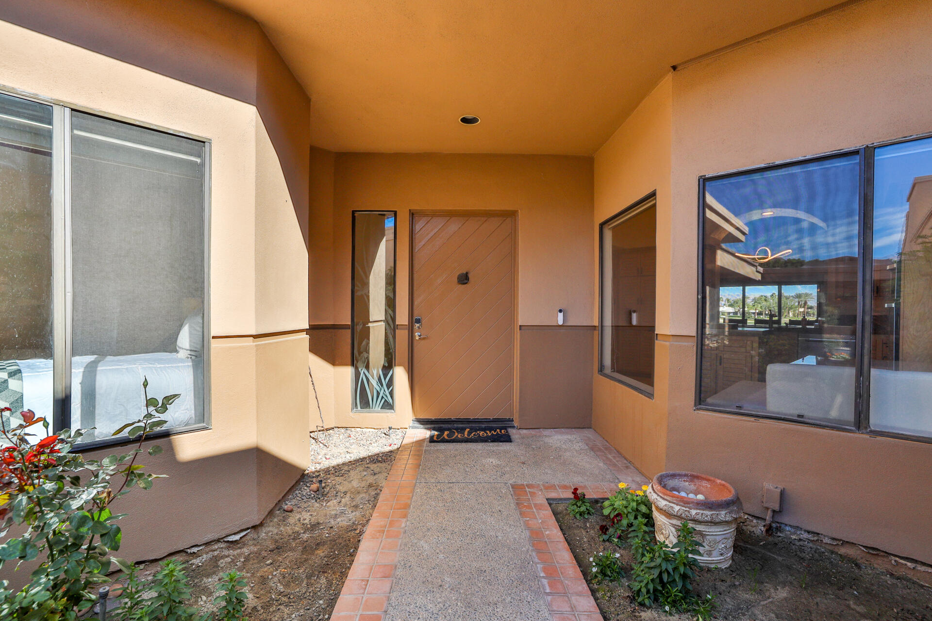 55764 Oak-Tree La Quinta, CA 92253 - Photo 38 of 50 a house view with a outdoor space