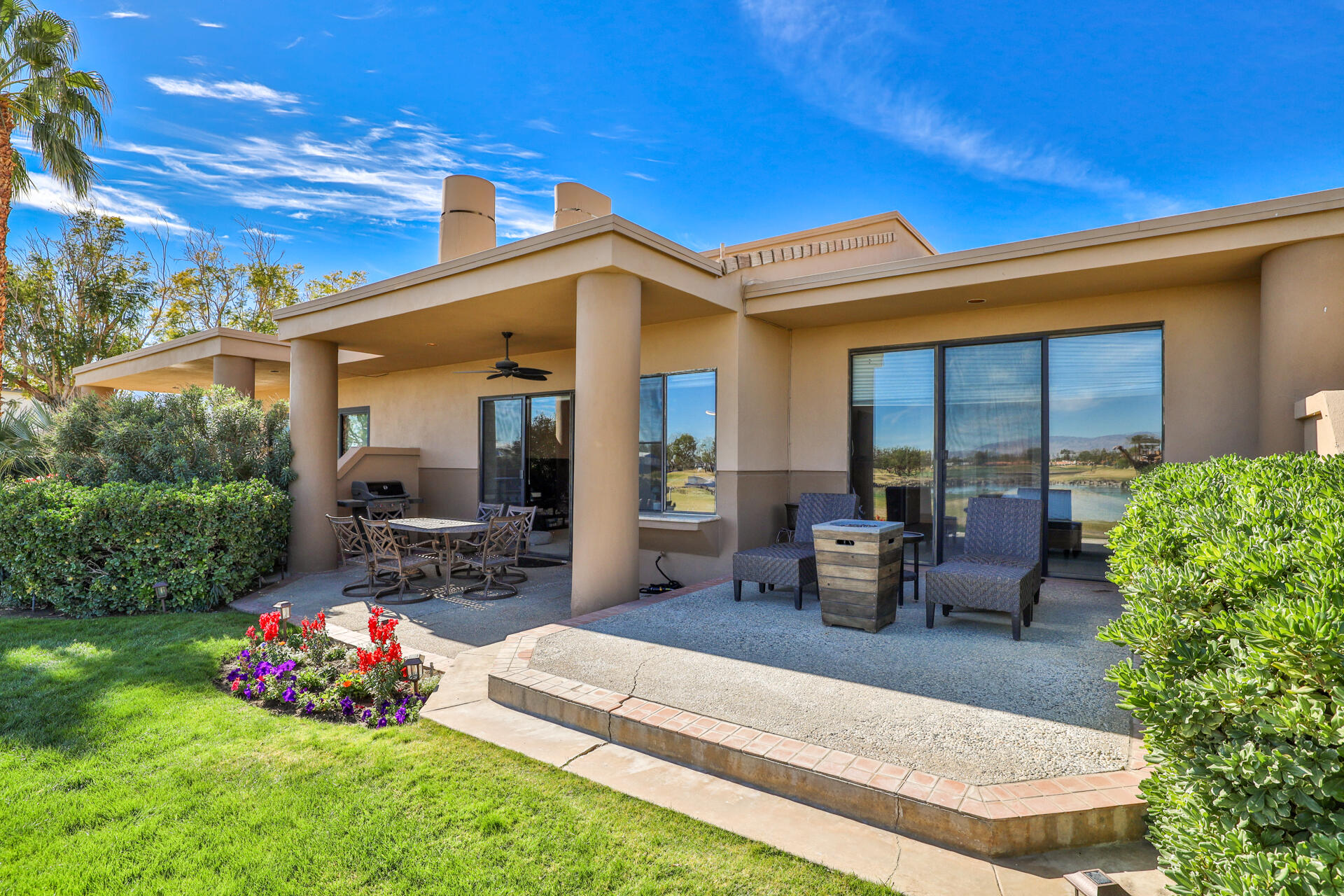 55764 Oak-Tree La Quinta, CA 92253 - Photo 5 of 50 a front view of a house with patio