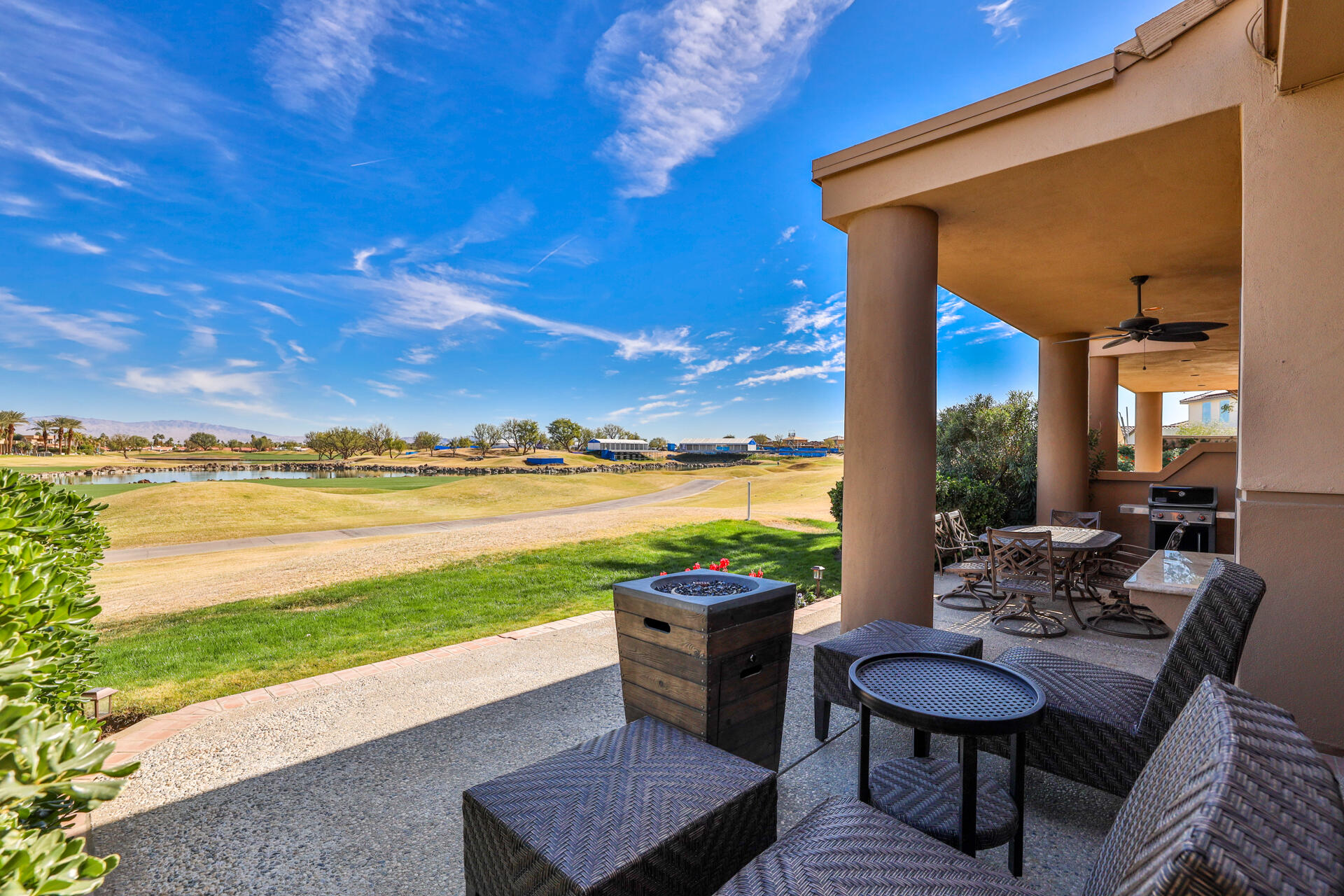 55764 Oak-Tree La Quinta, CA 92253 - Photo 6 of 50 a view of a ocean from a balcony with furniture