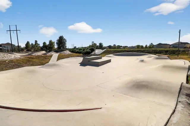 a front view of a house with swimming pool