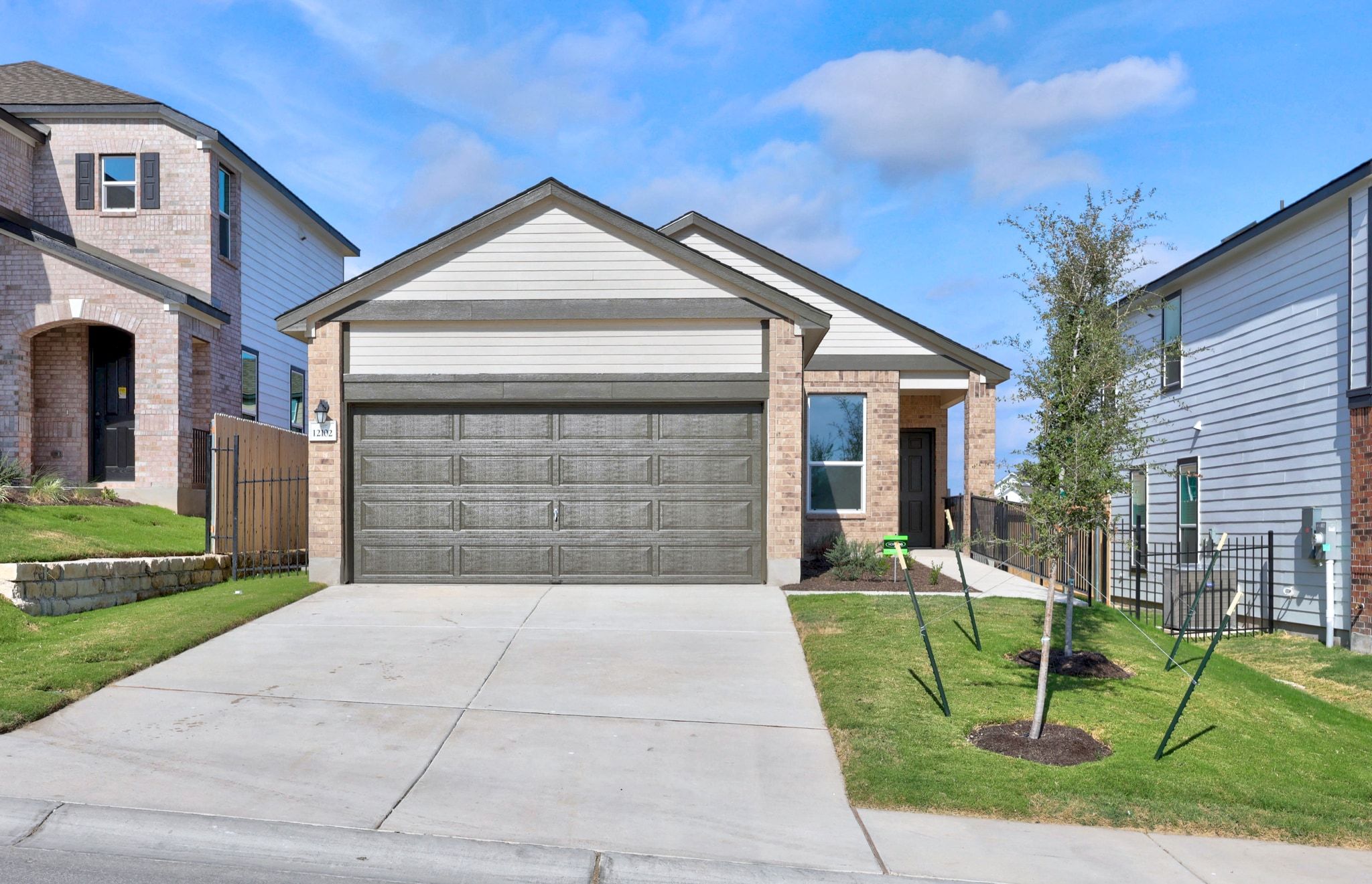12102 Cantabria Road Austin, TX 78748 - Photo 1 of 29 a front view of a house with a yard and porch