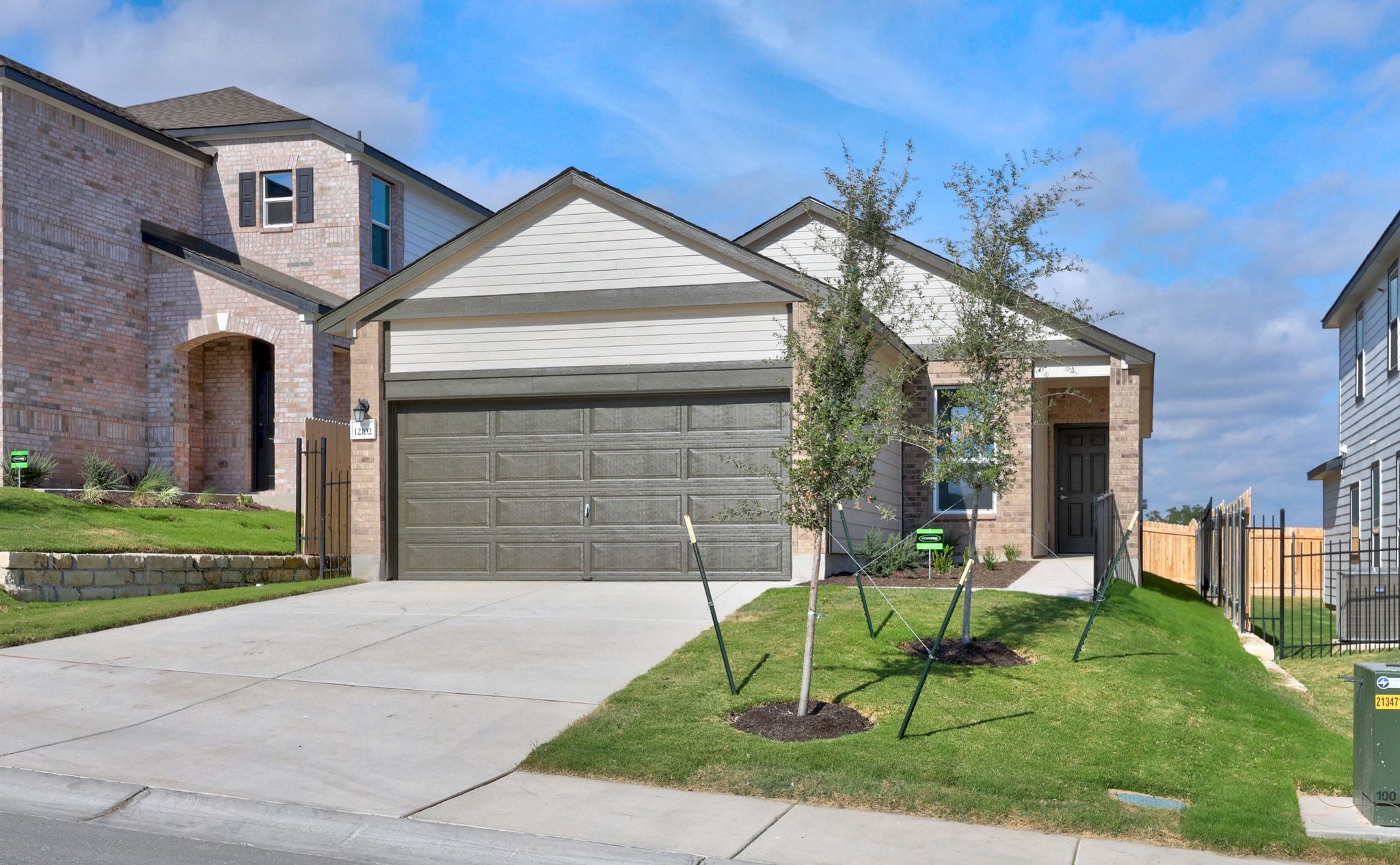 12102 Cantabria Road Austin, TX 78748 - Photo 2 of 29 a front view of a house with a yard