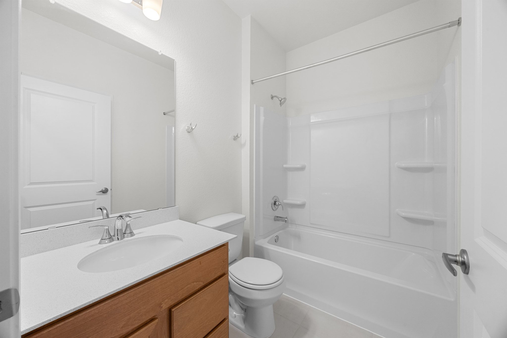 12102 Cantabria Road Austin, TX 78748 - Photo 22 of 29 a bathroom with a sink toilet vanity and shower