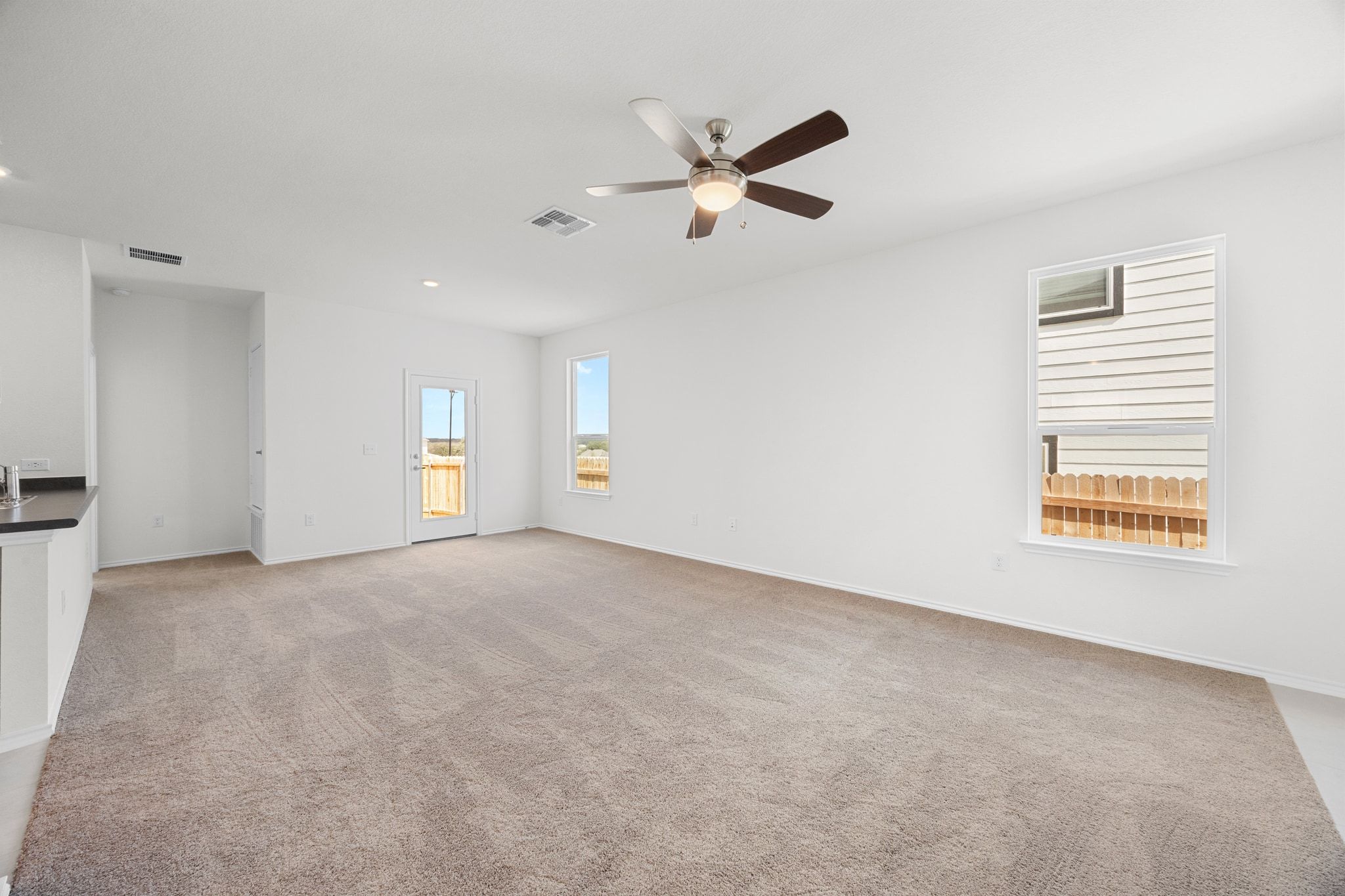 12102 Cantabria Road Austin, TX 78748 - Photo 6 of 29 a view of an empty room with a window