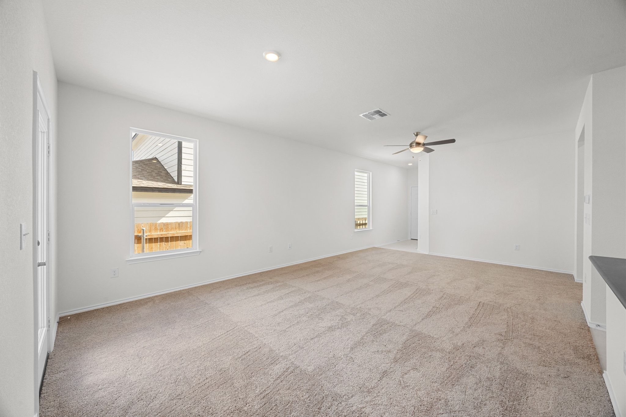 12102 Cantabria Road Austin, TX 78748 - Photo 7 of 29 a view of an empty room with a window