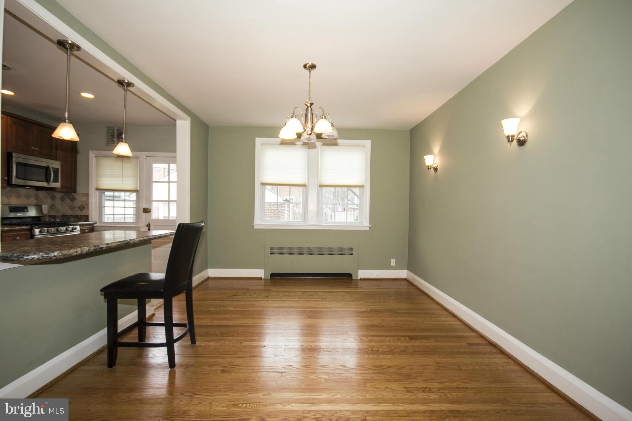 226 Murdock Road Baltimore, MD 21212 - Photo 5 of 19 a view of a livingroom with furniture and a window