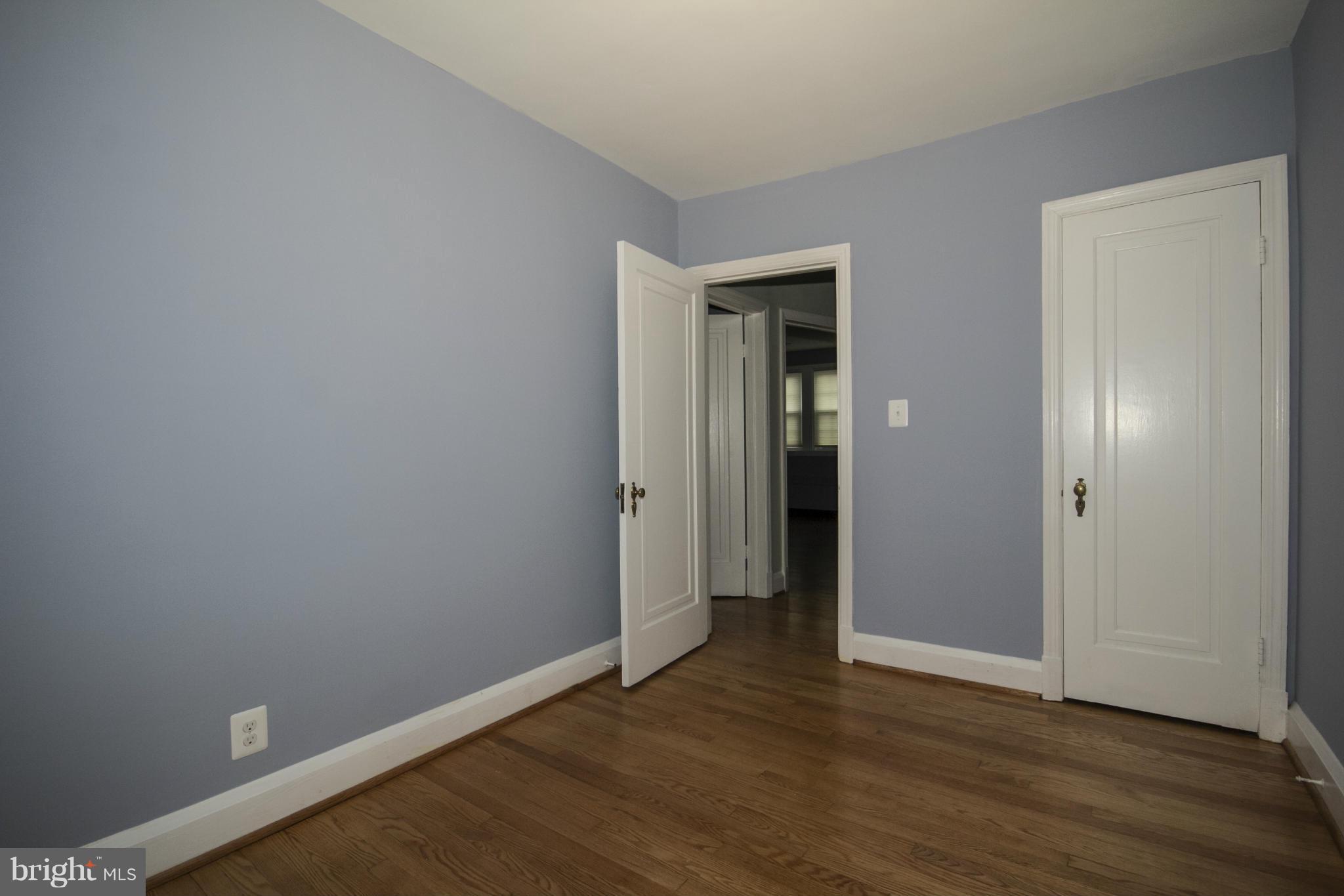 226 Murdock Road Baltimore, MD 21212 - Photo 10 of 19 an empty room with wooden floor & closet area