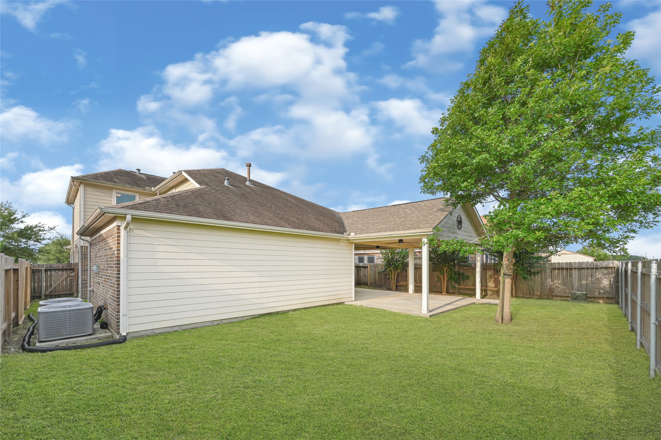 5331 Seabird Street Baytown, TX 77521 - Photo 35 of 38 a view of a house with a backyard