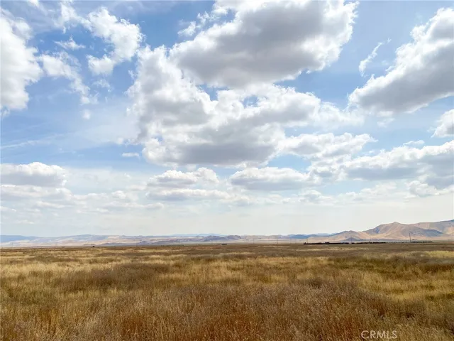 a view of lake with mountain