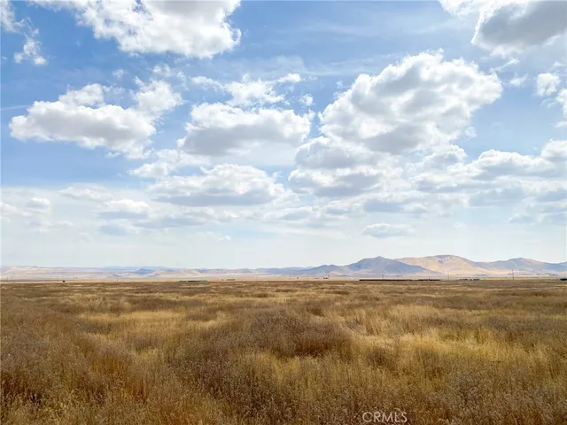 a view of lake and mountain