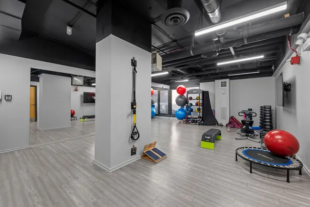 a view of a room with gym equipment