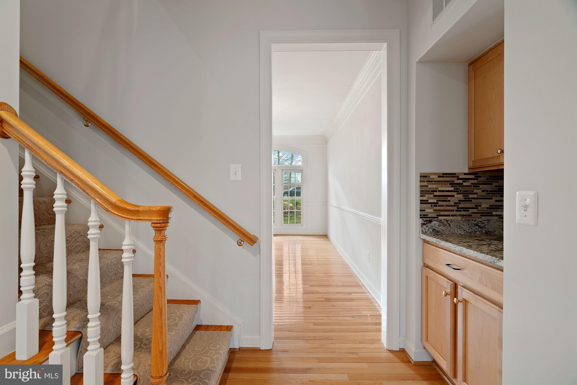 8550 Center Road Springfield, VA 22152 - Photo 14 of 63 2nd staircase to upper level is off kitch
