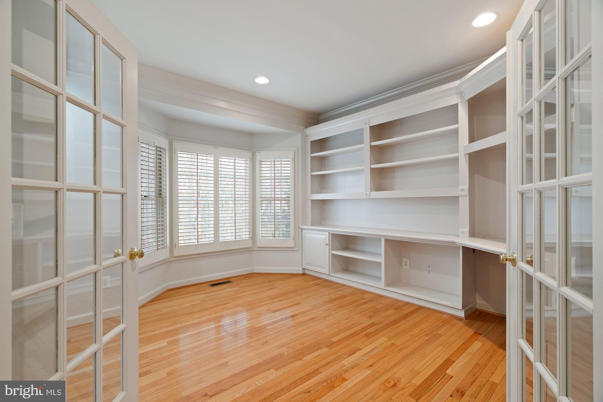8550 Center Road Springfield, VA 22152 - Photo 10 of 63 Office w/wrap around shelving & plantation shutter