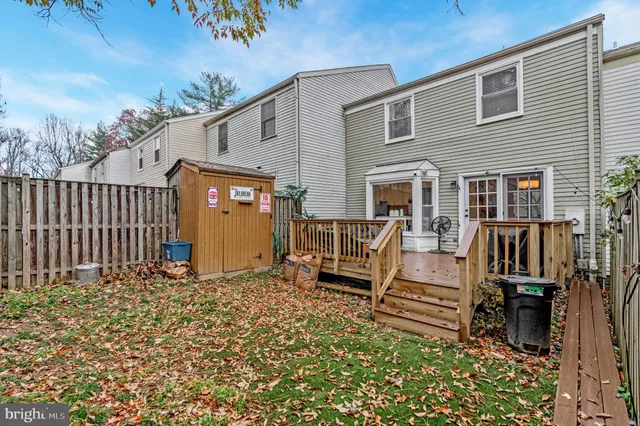 a view of a chairs and a table in the patio