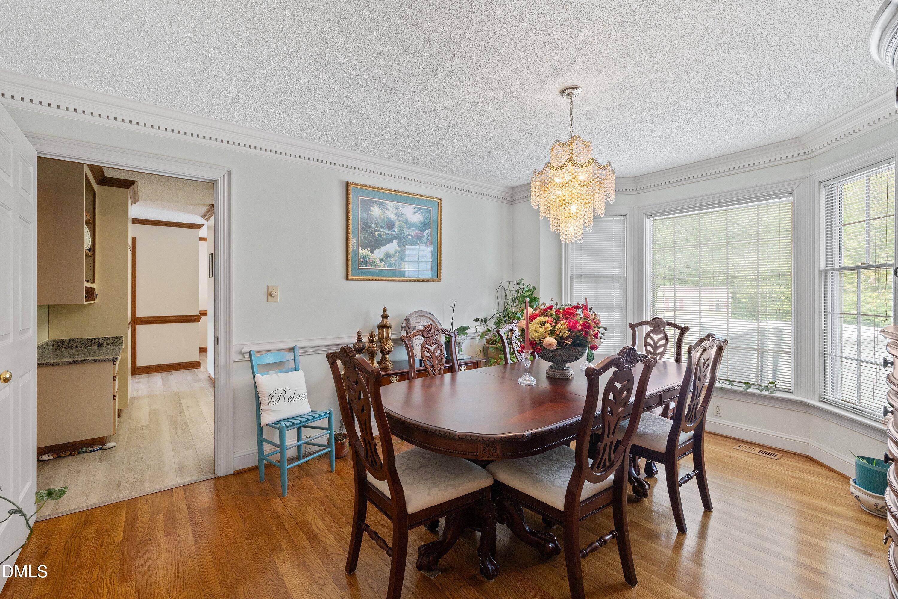 6314 Old Davis Road Sims, NC 27880 - Photo 35 of 71 a dining room with furniture window and wooden floor