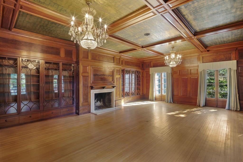 39 Clyde Street Brookline, MA 02467 - Photo 11 of 31 a view of an empty room with wooden floor and a window