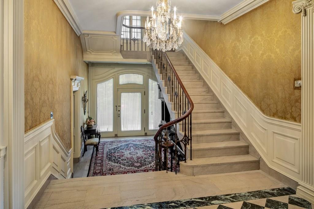 39 Clyde Street Brookline, MA 02467 - Photo 18 of 31 a view of entryway and hall with wooden floor