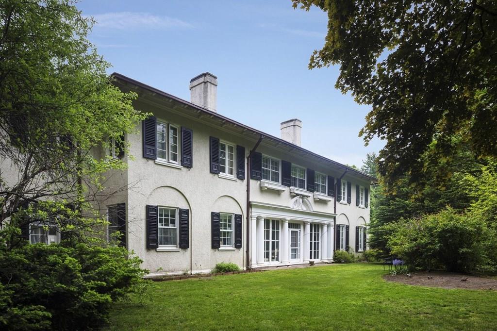 39 Clyde Street Brookline, MA 02467 - Photo 2 of 31 a front view of a house with a yard