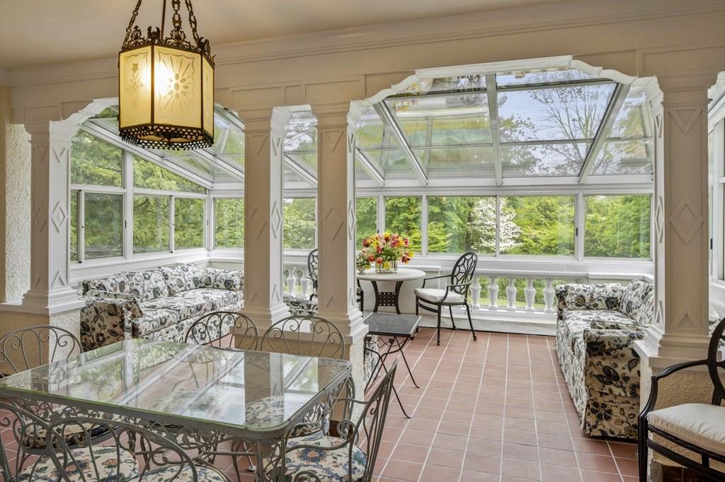 39 Clyde Street Brookline, MA 02467 - Photo 23 of 31 a living room with furniture and a large window