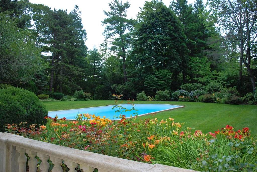 39 Clyde Street Brookline, MA 02467 - Photo 31 of 31 a view of a large yard with plants and large trees