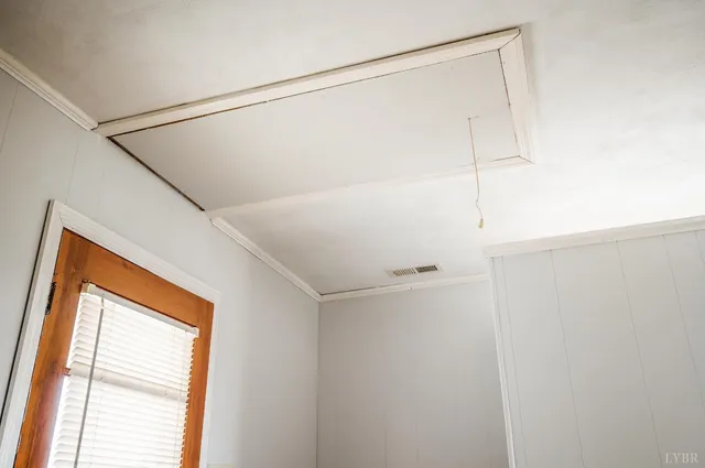 a view of a swimming pool with mountains in the background