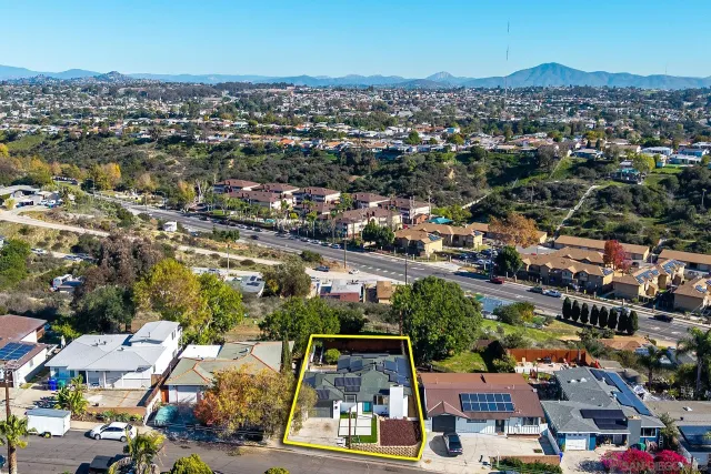 a house view with a swimming pool