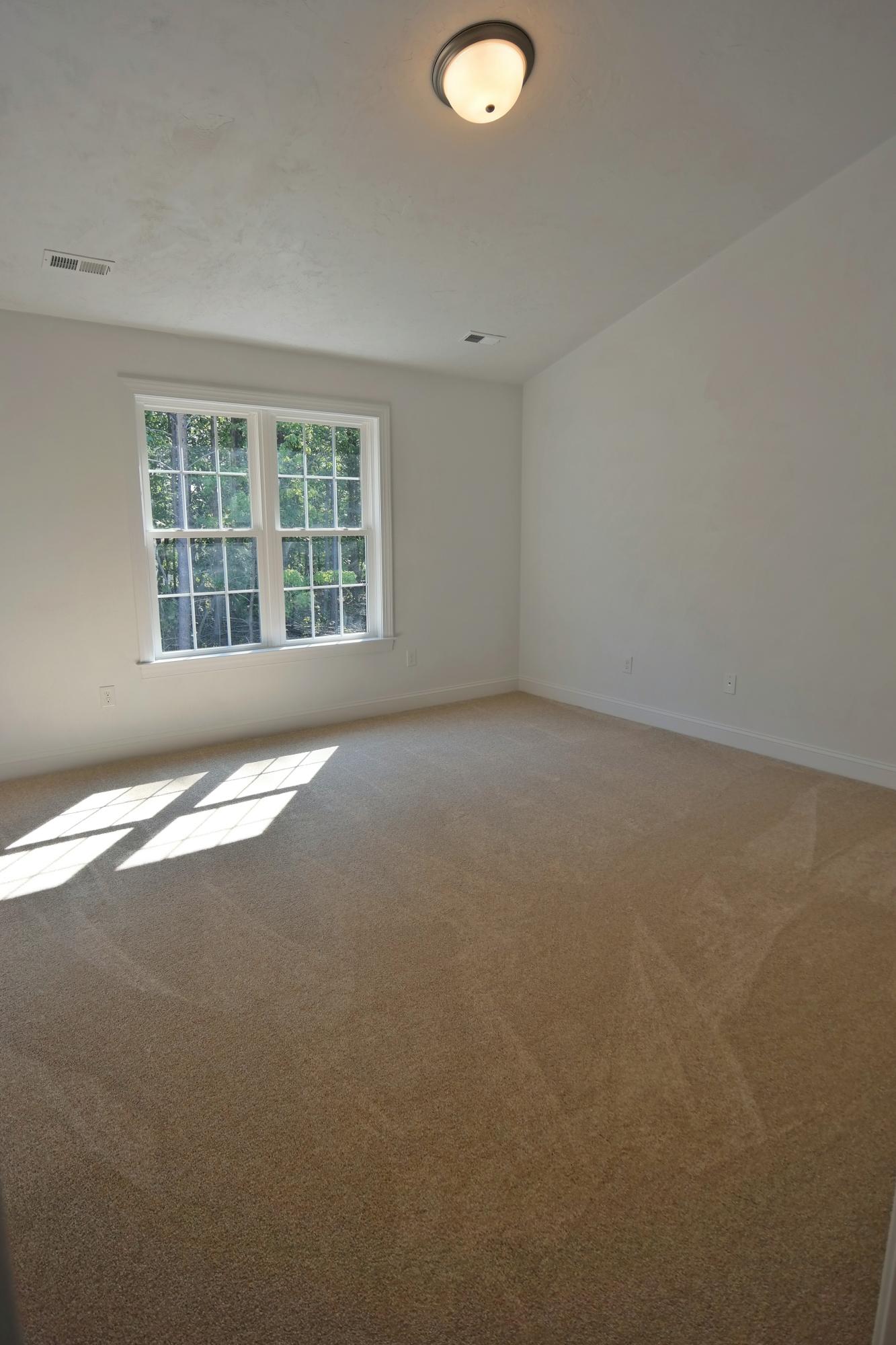 726 Thornblade Way Blue Ridge, VA 24064 - Photo 8 of 27 an empty room with a window