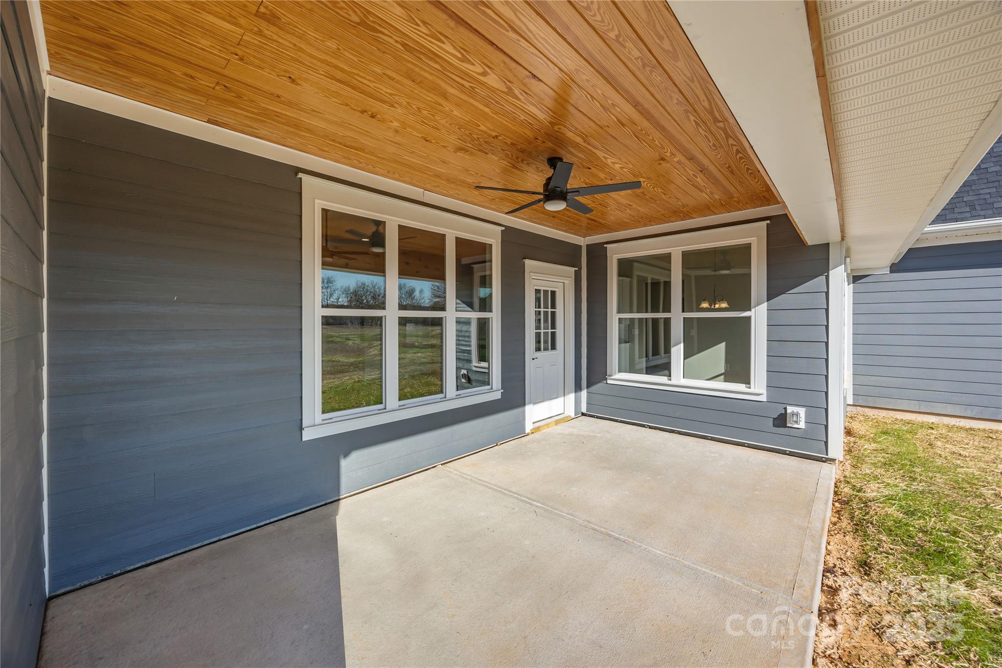 17826 Brattain Road Locust, NC 28097 - Photo 11 of 44 a view of an empty room with a window