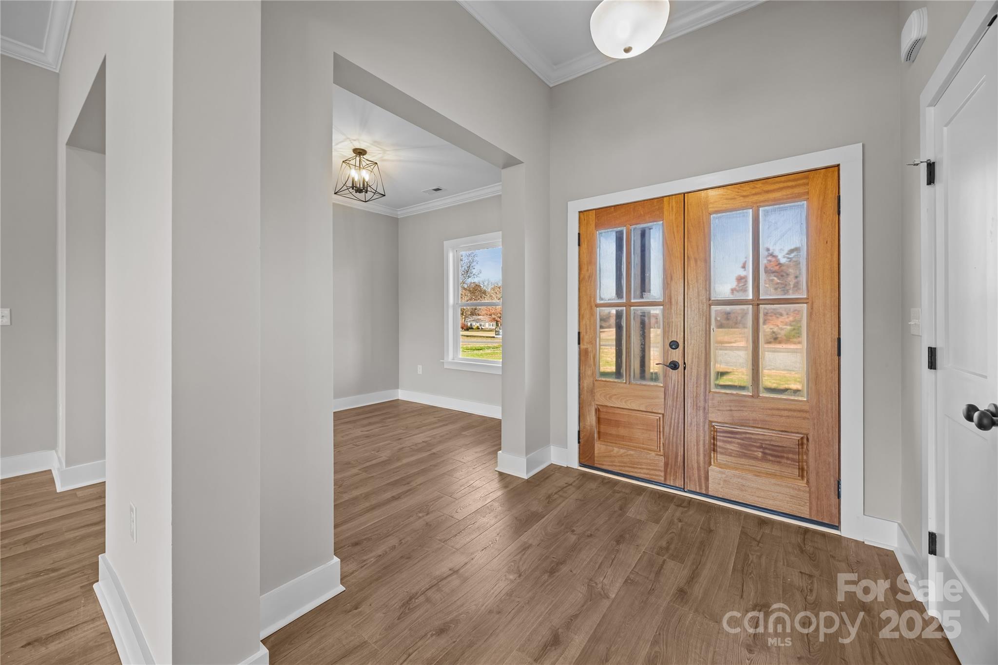 17826 Brattain Road Locust, NC 28097 - Photo 14 of 44 wooden floor in an empty room with a window