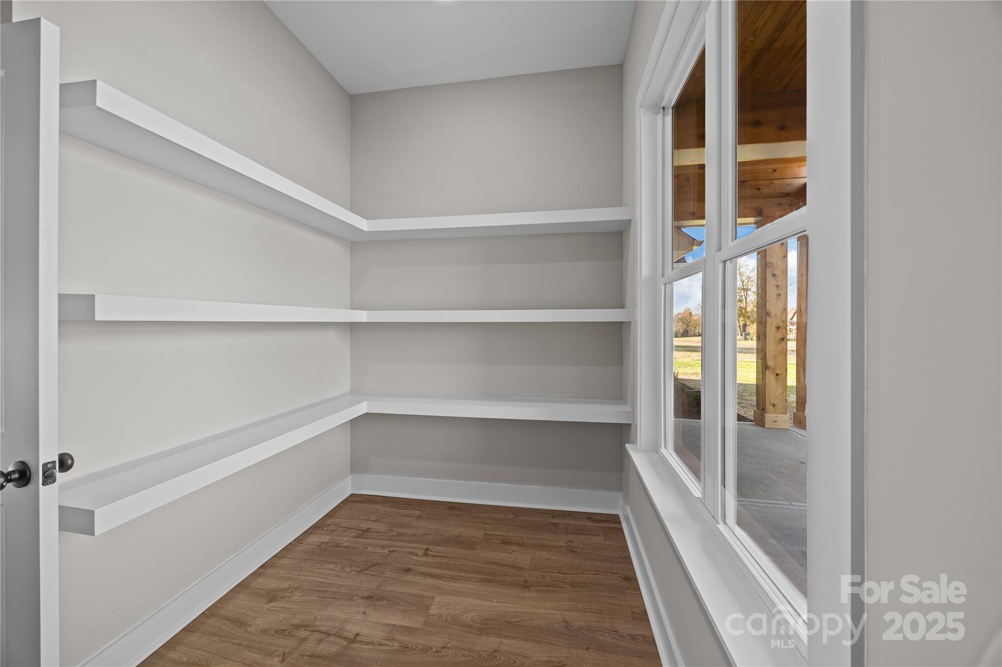 17826 Brattain Road Locust, NC 28097 - Photo 25 of 44 a view of an empty walk in closet