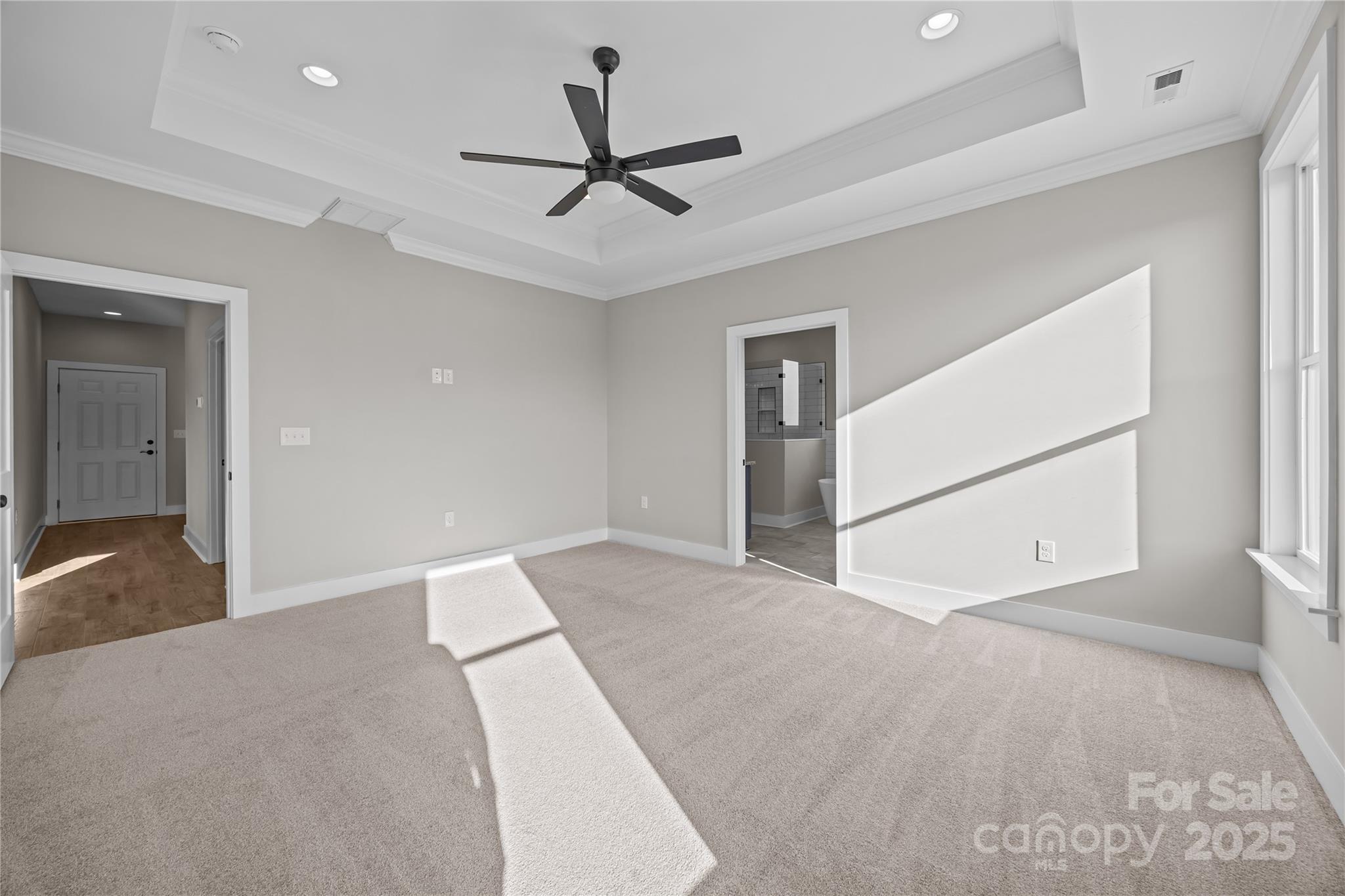 17826 Brattain Road Locust, NC 28097 - Photo 27 of 44 a view of a livingroom with a ceiling fan