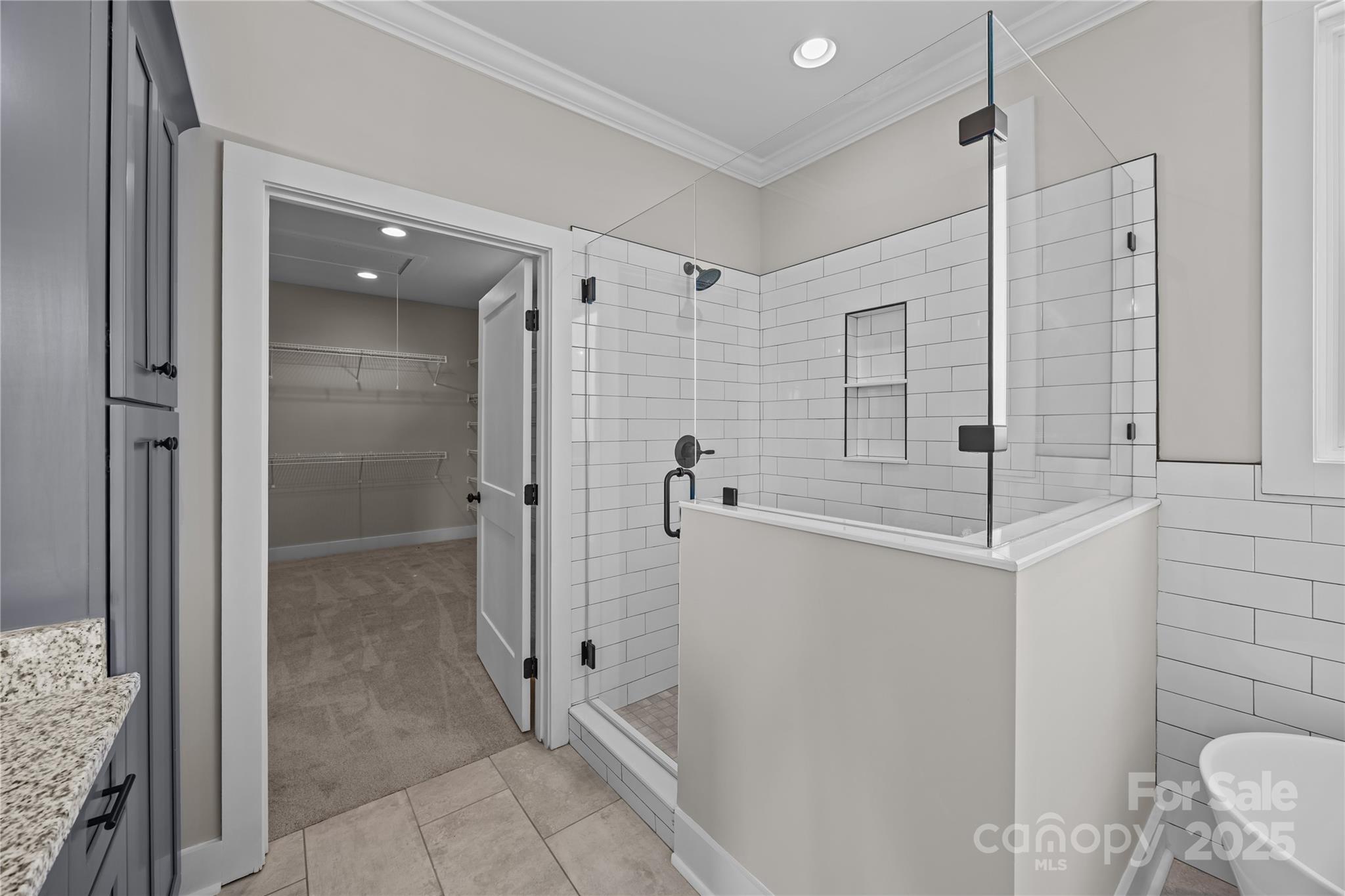 17826 Brattain Road Locust, NC 28097 - Photo 30 of 44 a bathroom with a shower and a sink