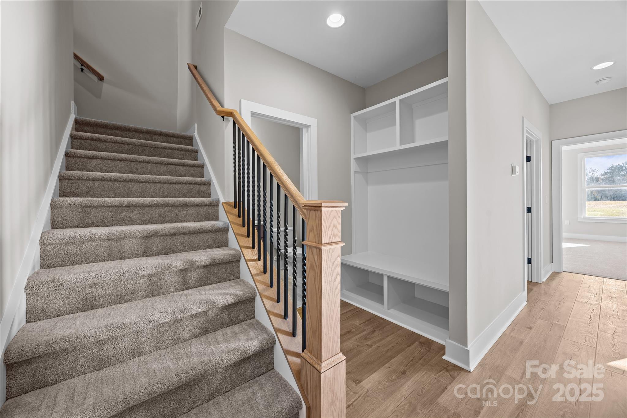 17826 Brattain Road Locust, NC 28097 - Photo 34 of 44 a view of a hallway with wooden floor and entryway