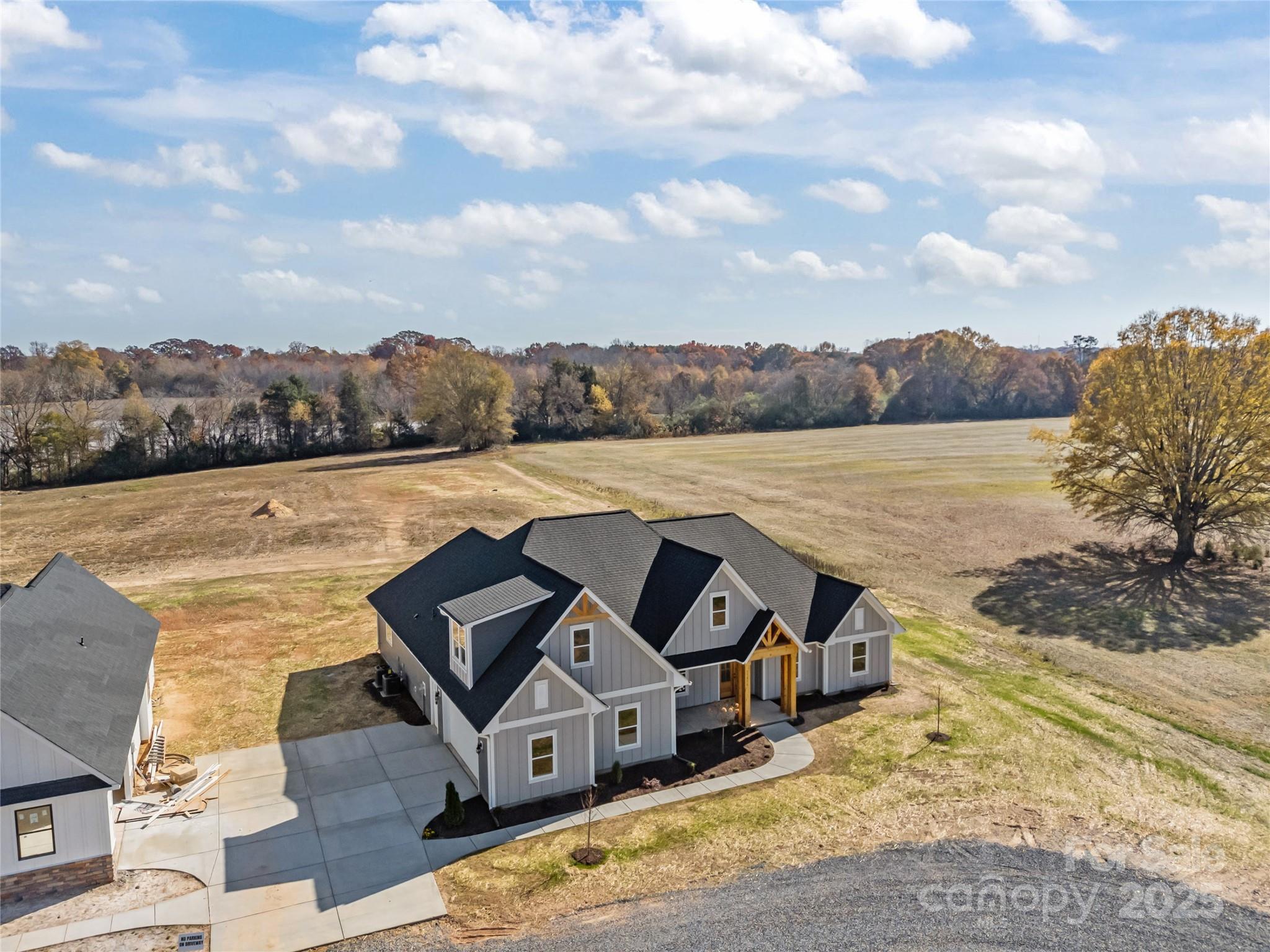 17826 Brattain Road Locust, NC 28097 - Photo 5 of 44 an aerial view of houses with outdoor space