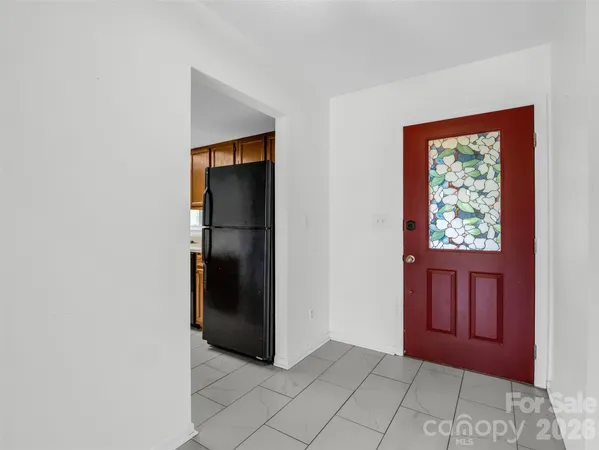 a kitchen with stainless steel appliances granite countertop a sink stove and microwave