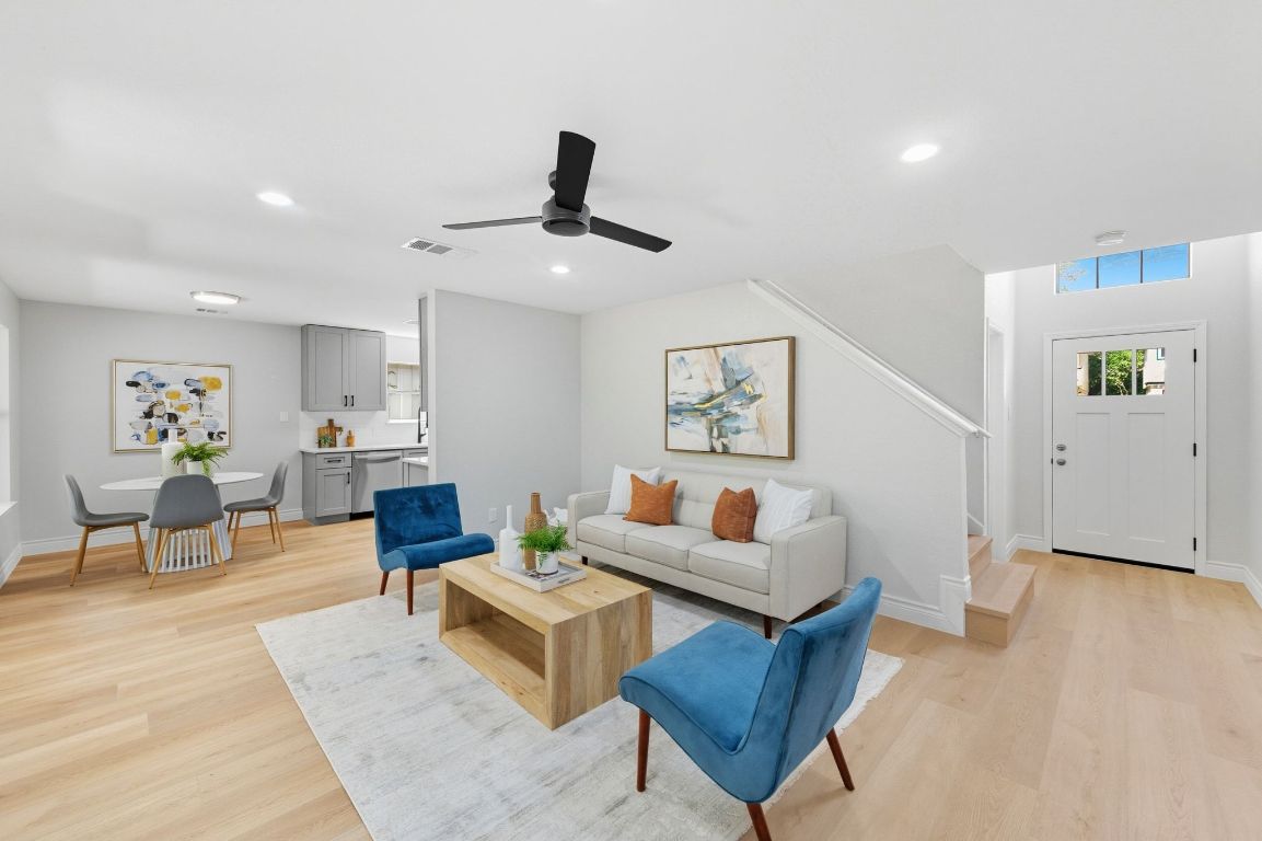 12909 Marimba Trail Austin, TX 78729 - Photo 1 of 1 a living room with furniture and wooden floor