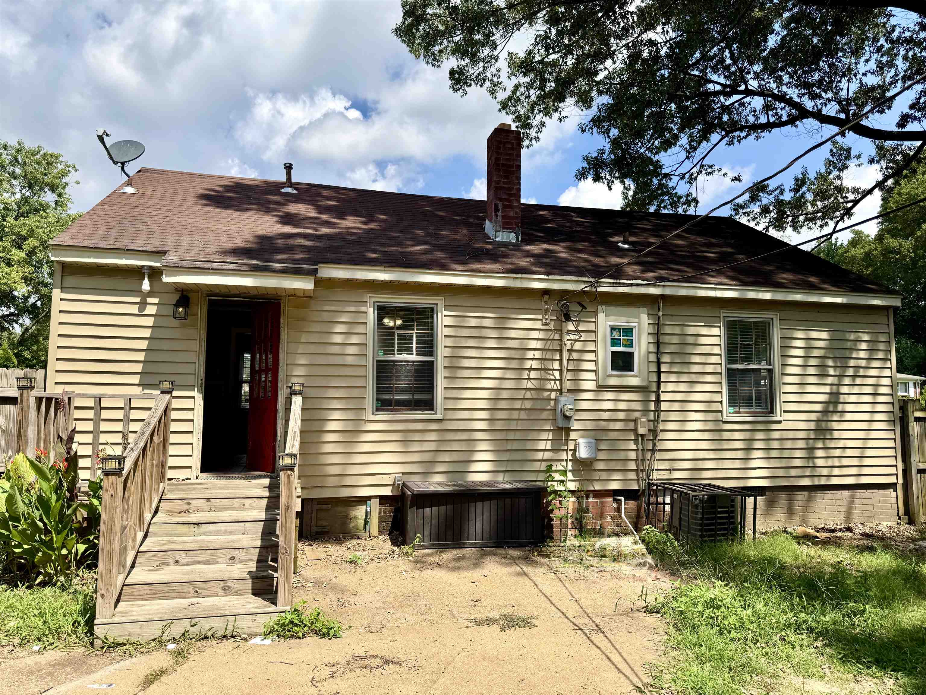 3787 Rhodes Avenue Memphis, TN 38111 - Photo 21 of 23 a front view of a house with a yard