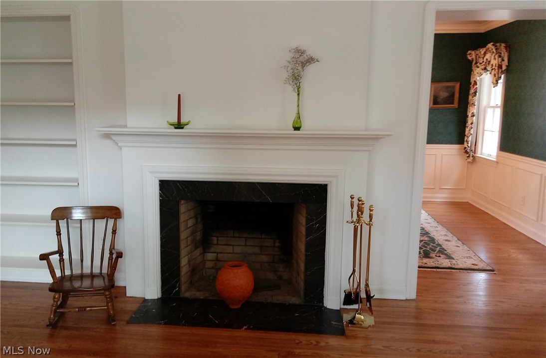 4181 Bushnell Road University Heights, OH 44118 - Photo 6 of 22 Charming fireplace and surround. Opening leading to dining room.