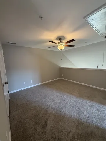 a view of a room with an empty space