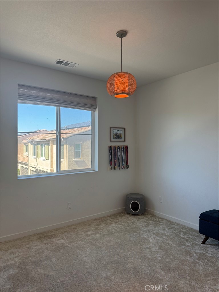 32412 Tannat Drive Temecula, CA 92591 - Photo 13 of 28 a view of an empty room with a window