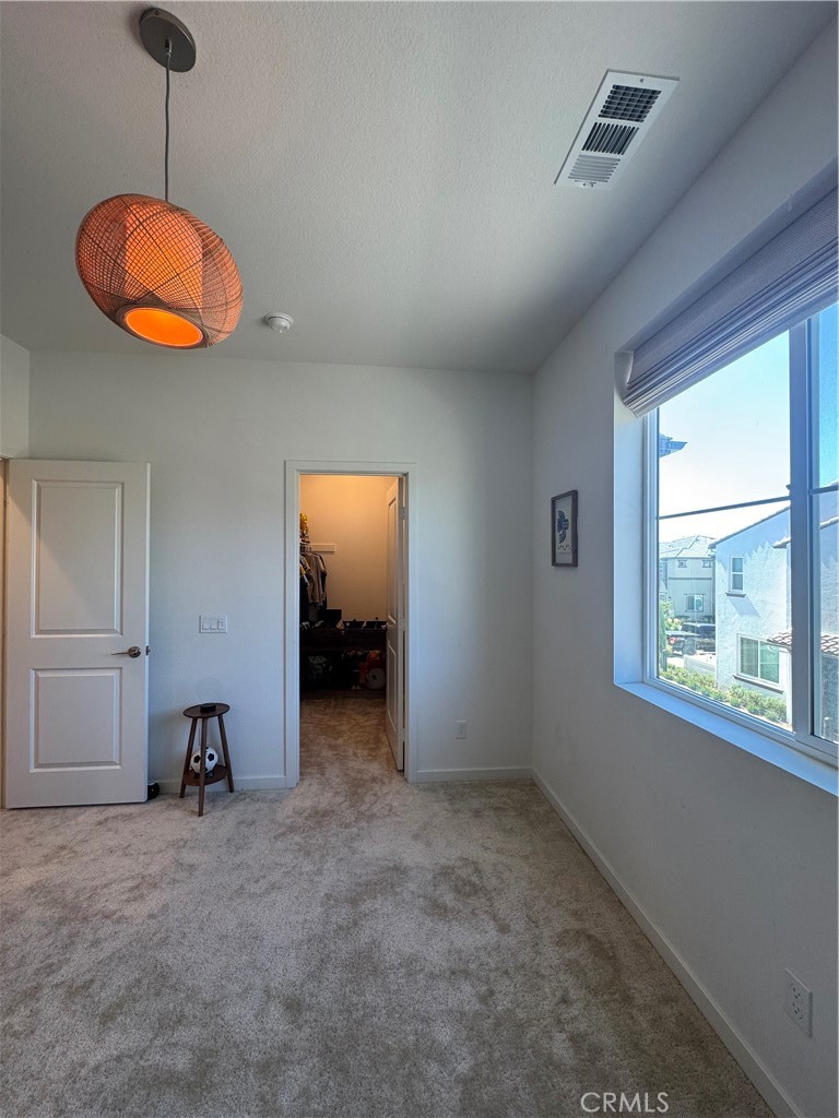 32412 Tannat Drive Temecula, CA 92591 - Photo 15 of 28 a view of a room with window and furniture