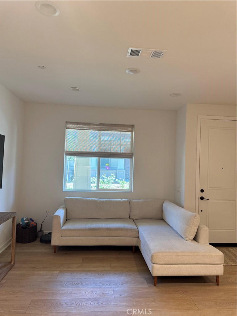 32412 Tannat Drive Temecula, CA 92591 - Photo 5 of 28 a bedroom with a bed and a couch