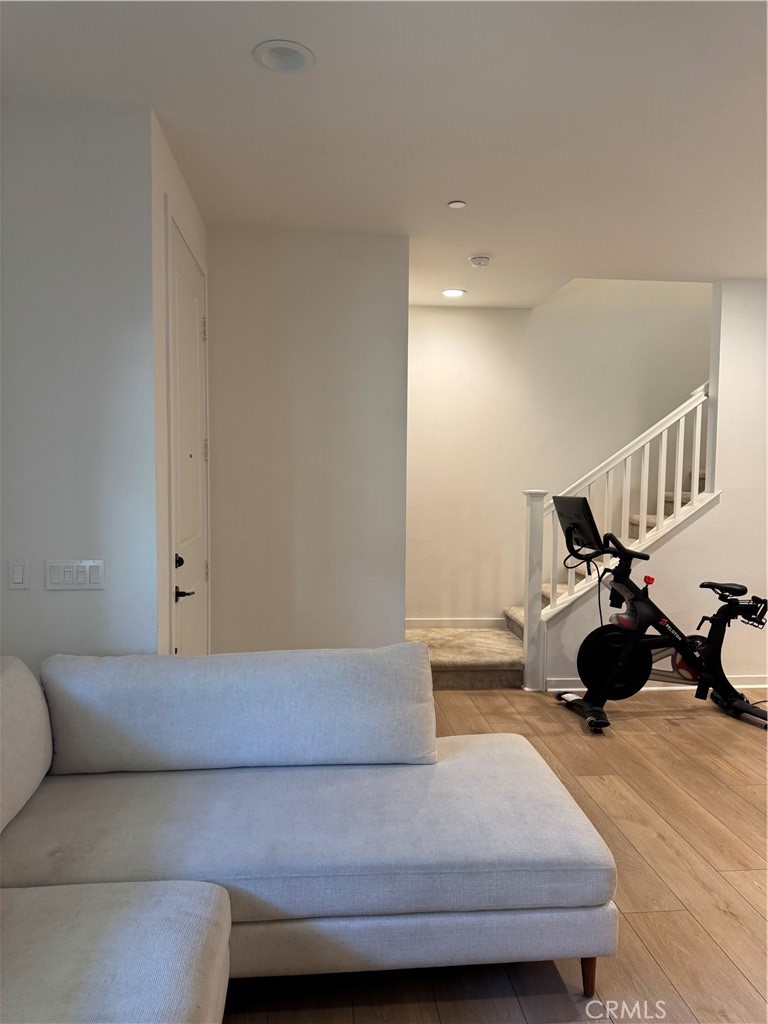32412 Tannat Drive Temecula, CA 92591 - Photo 9 of 28 a living room with furniture and a wooden floor