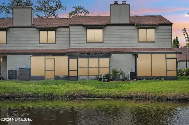 a house that has a big yard in front of it