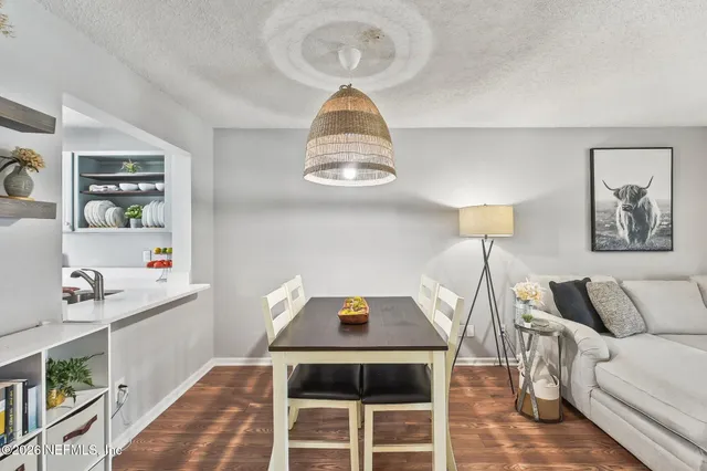 a workspace with furniture and window