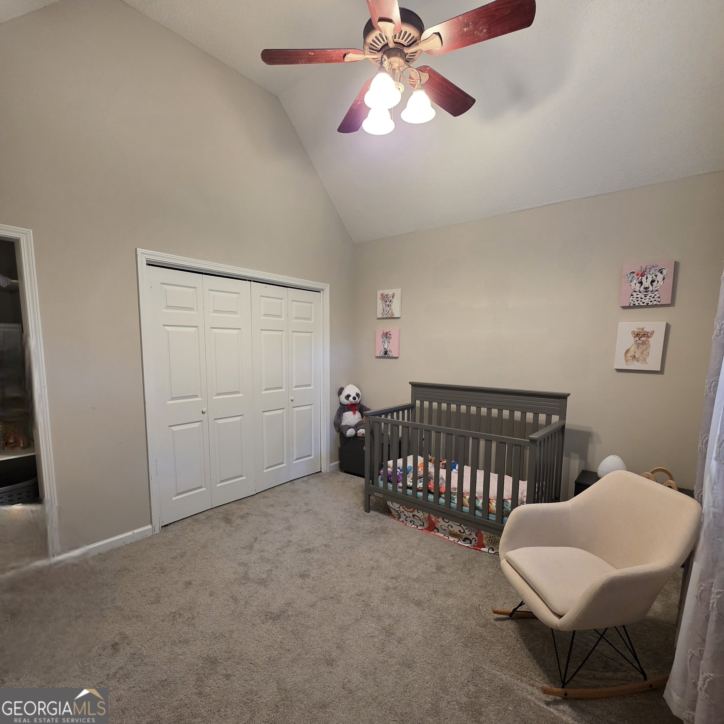 3117 Fairmond Court Villa Rica, GA 30180 - Photo 13 of 20 a bedroom with furniture and a chandelier fan