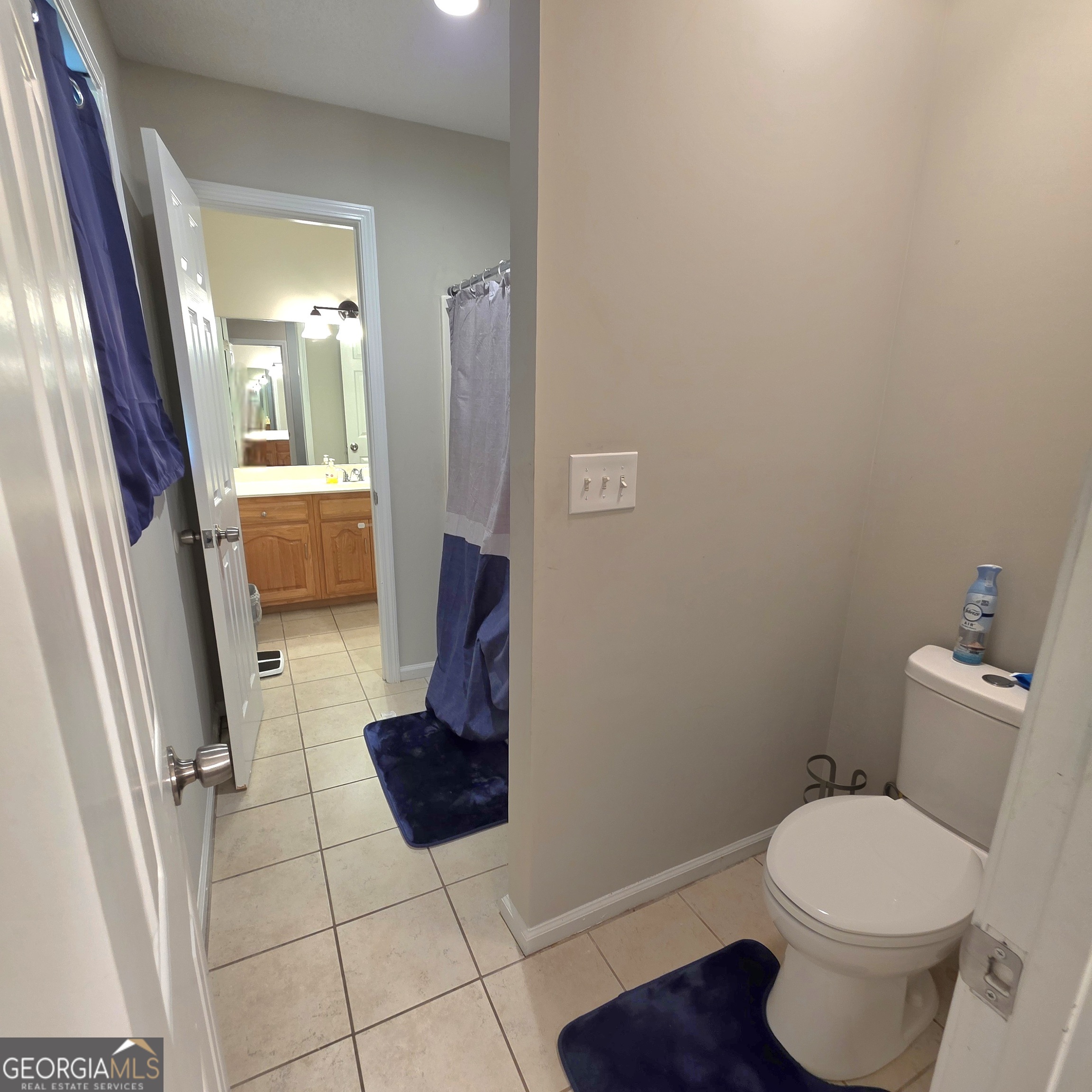 3117 Fairmond Court Villa Rica, GA 30180 - Photo 16 of 20 a bathroom with a toilet and a shower