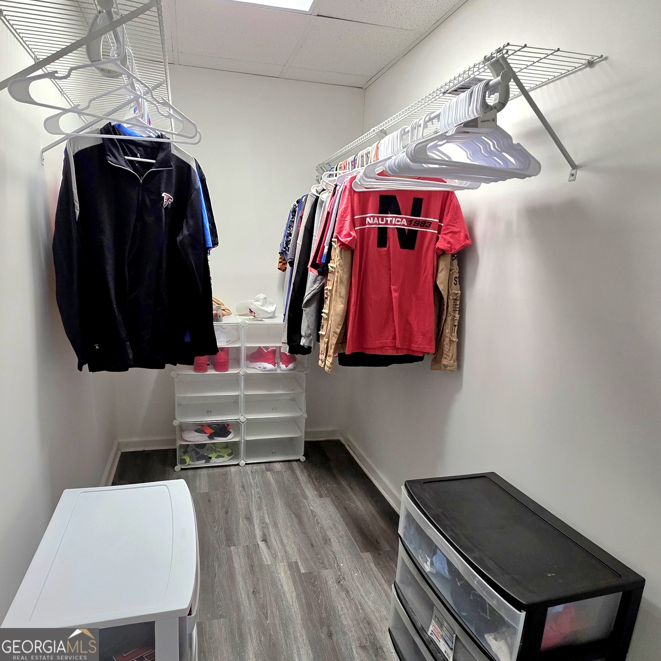 3117 Fairmond Court Villa Rica, GA 30180 - Photo 20 of 20 a view of walk in closet with clothes and shoes